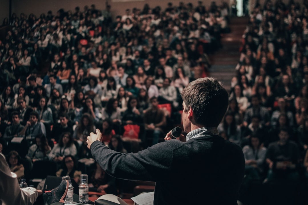 speaker rehearsing a clear presentation before speaking to a large audience